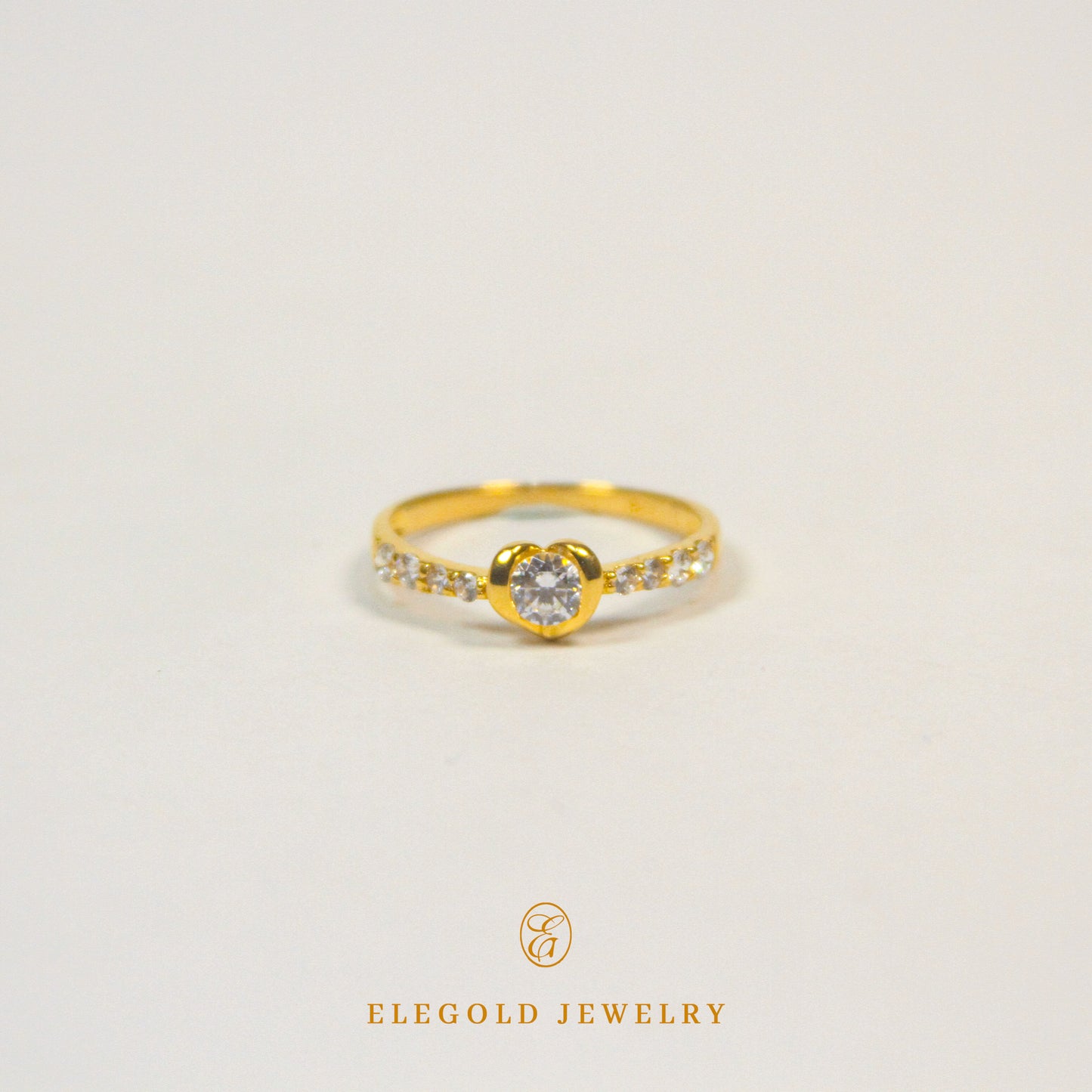 Elegold Heart Shape CZ Side Stone Gold Ring