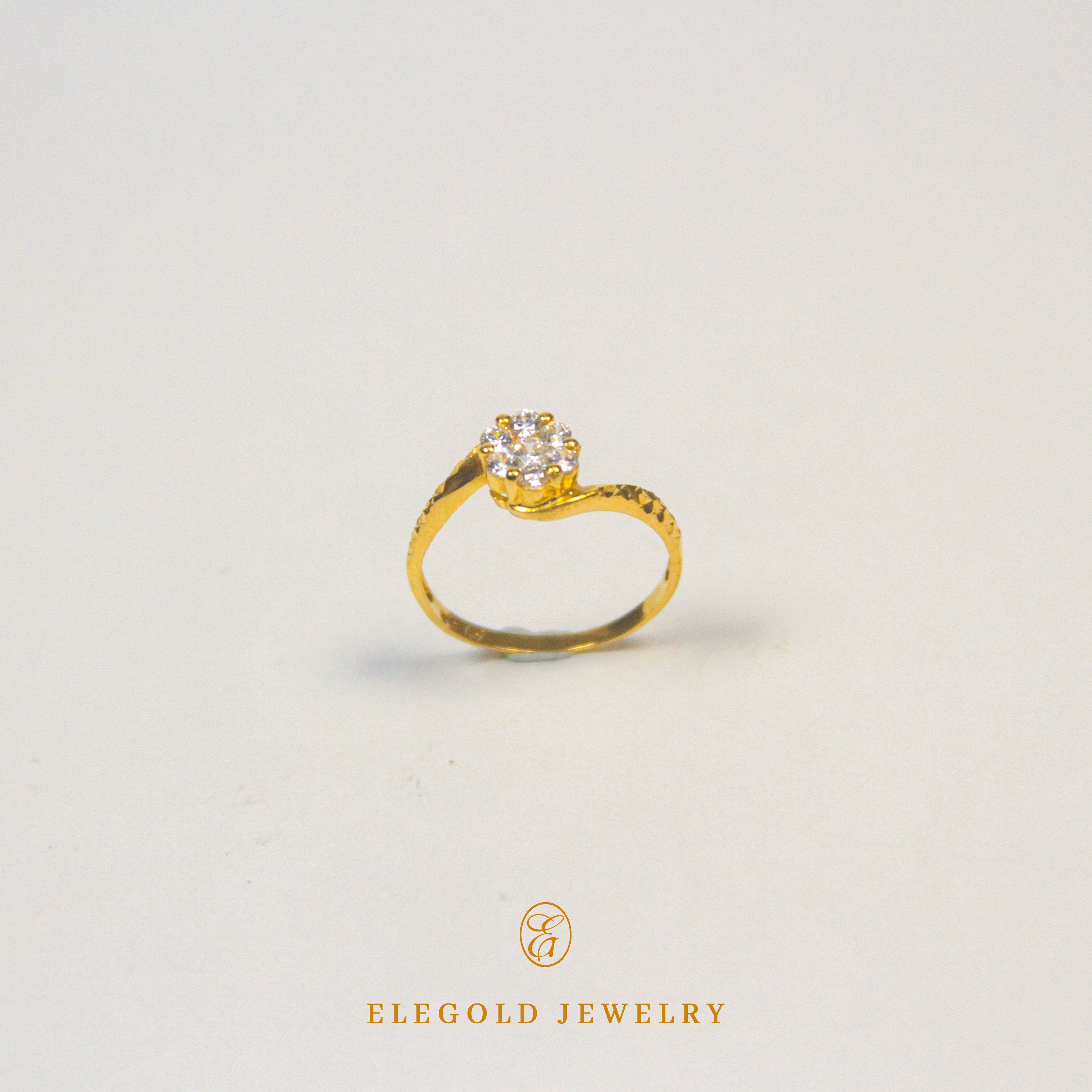 Elegold Bypass Round Cut Cubic Zirconia Stone Gold Ring