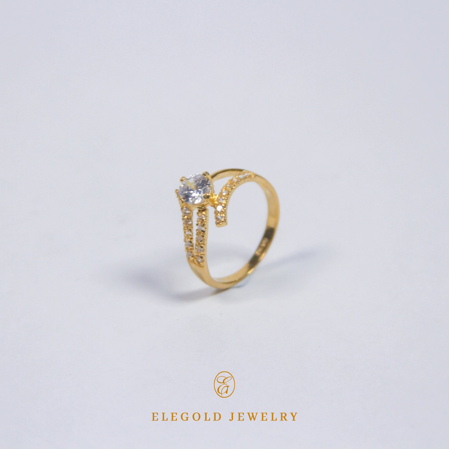 Elegold Fashion CZ Side Stone Gold Ring