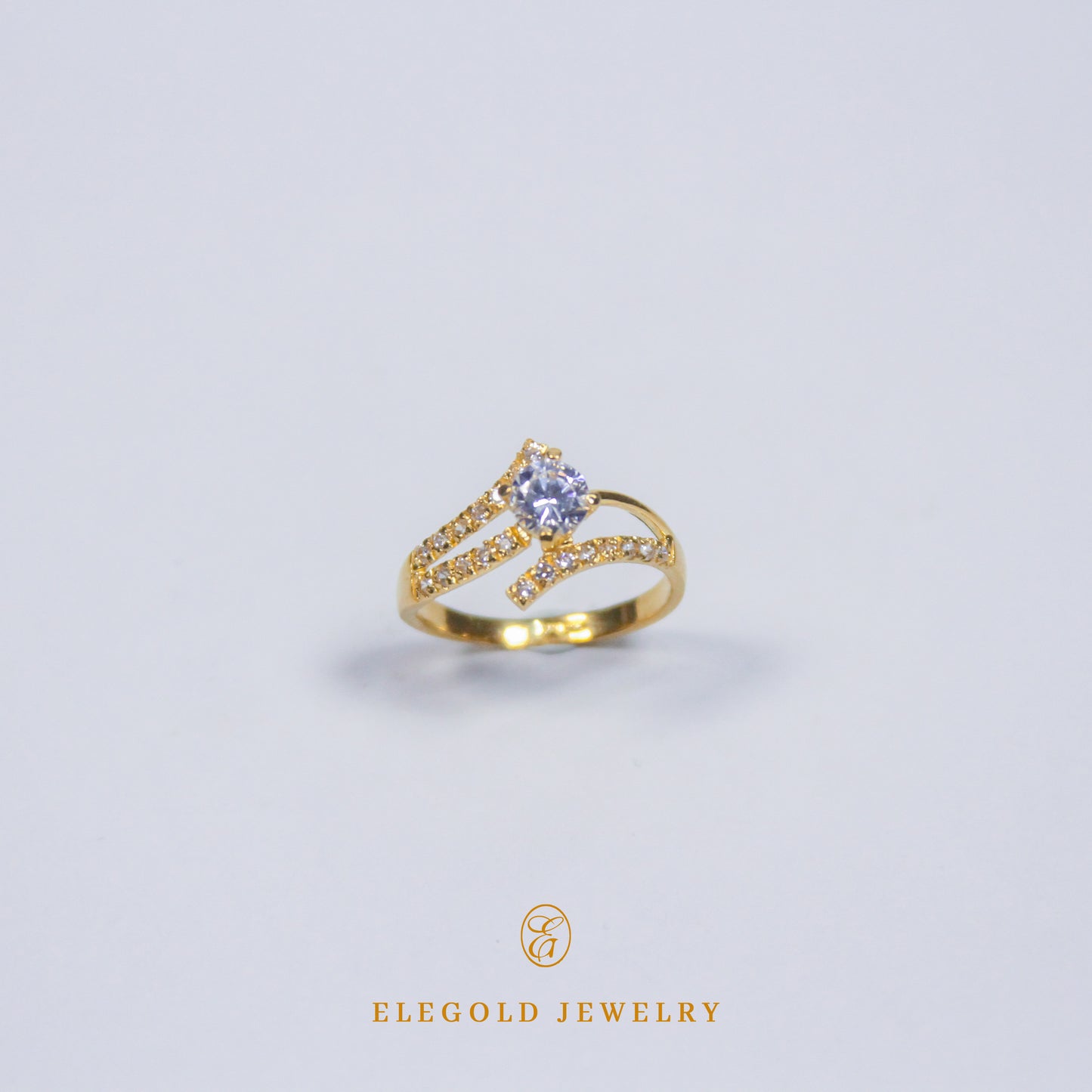 Elegold Fashion CZ Side Stone Gold Ring