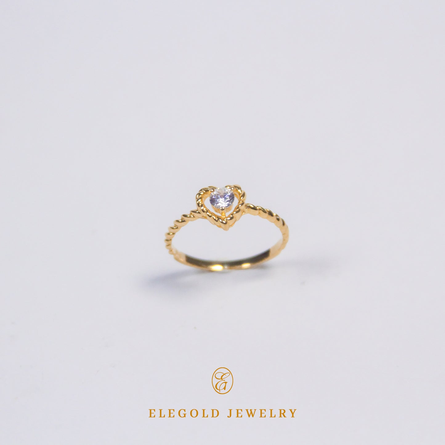 Elegold Heart Shape CZ Stone Twist Gold Ring