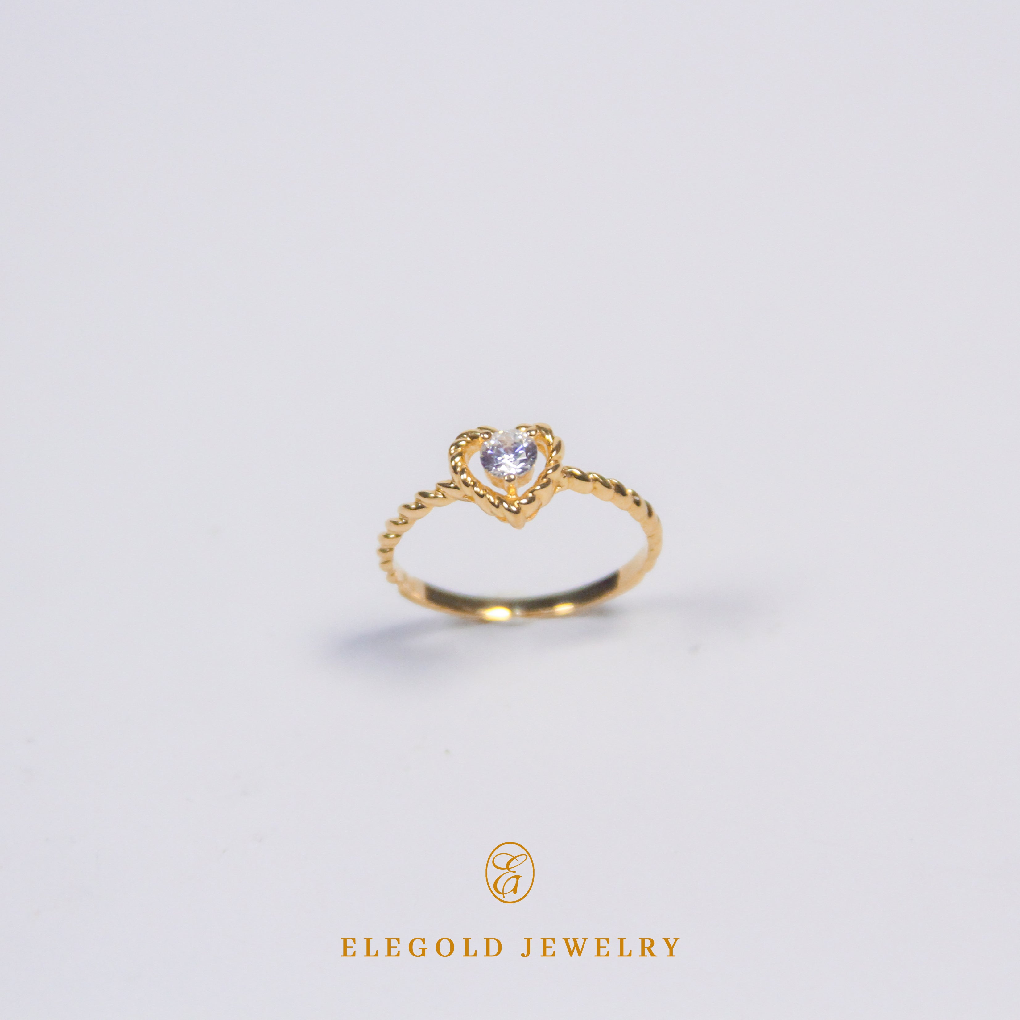 Elegold Heart Shape CZ Stone Twist Gold Ring